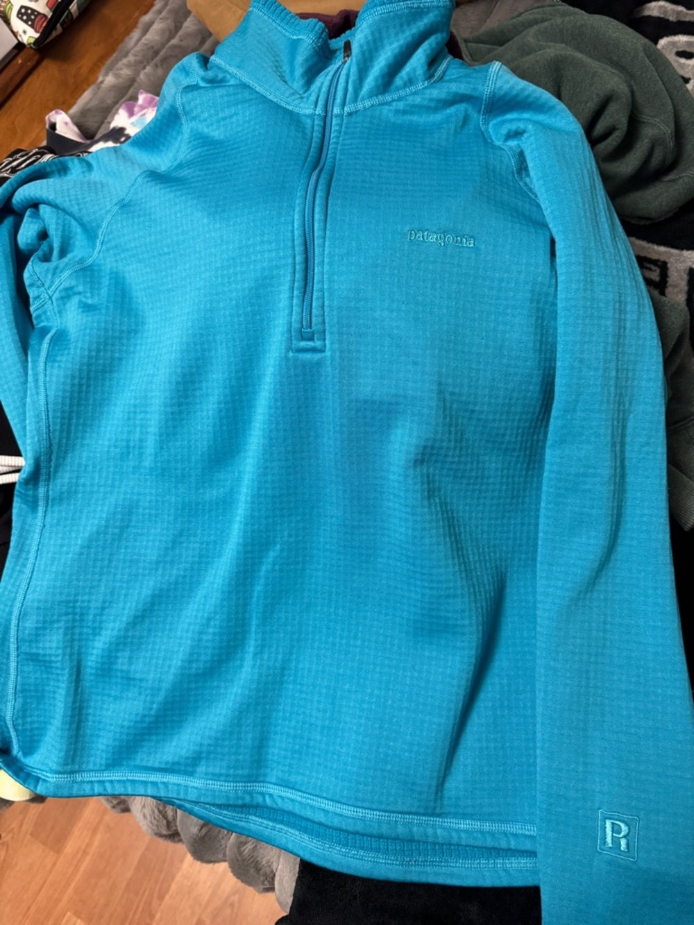 Patagonia women’s Turquoise Quarter-Zip Performance Sweater R1
